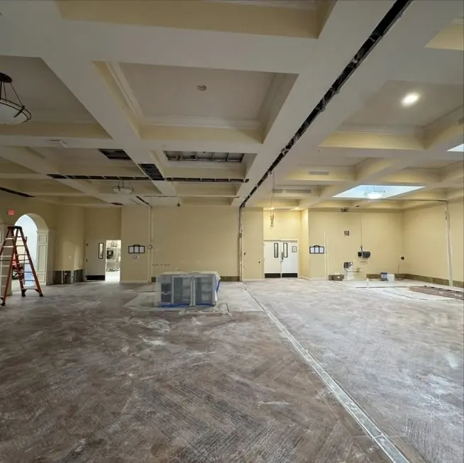 Coffered-ceiling hall cleared of finishes