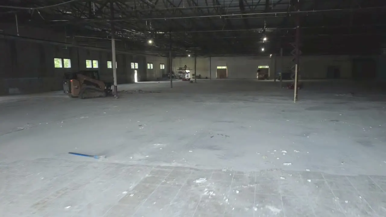 The gutted interior of the Waycross building, empty to the slab
